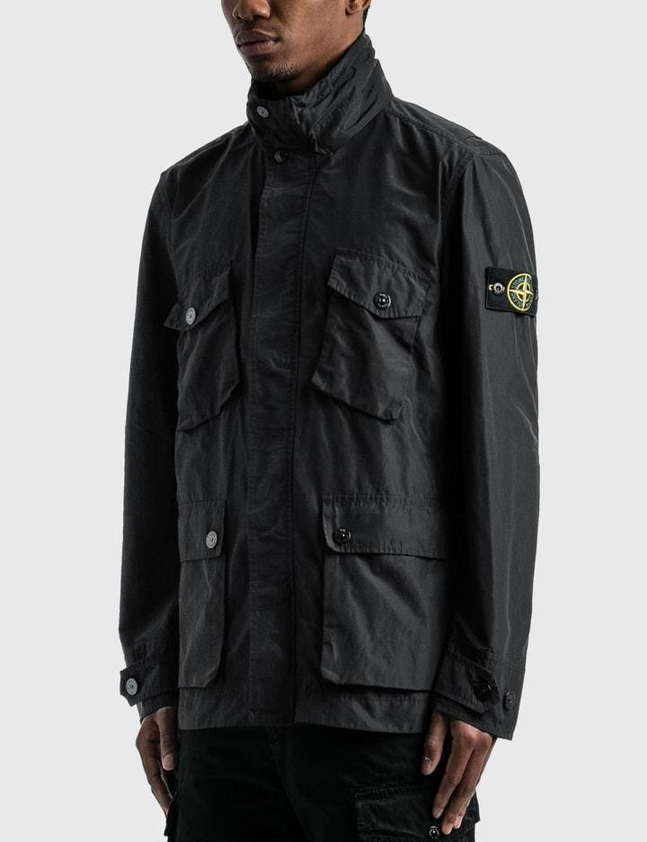 Several Stone Island jackets arranged for material and silhouette comparison.