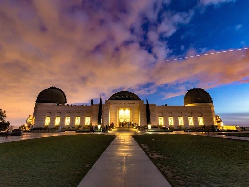 Griffith Observatory glowing above the Los Angeles city lights.