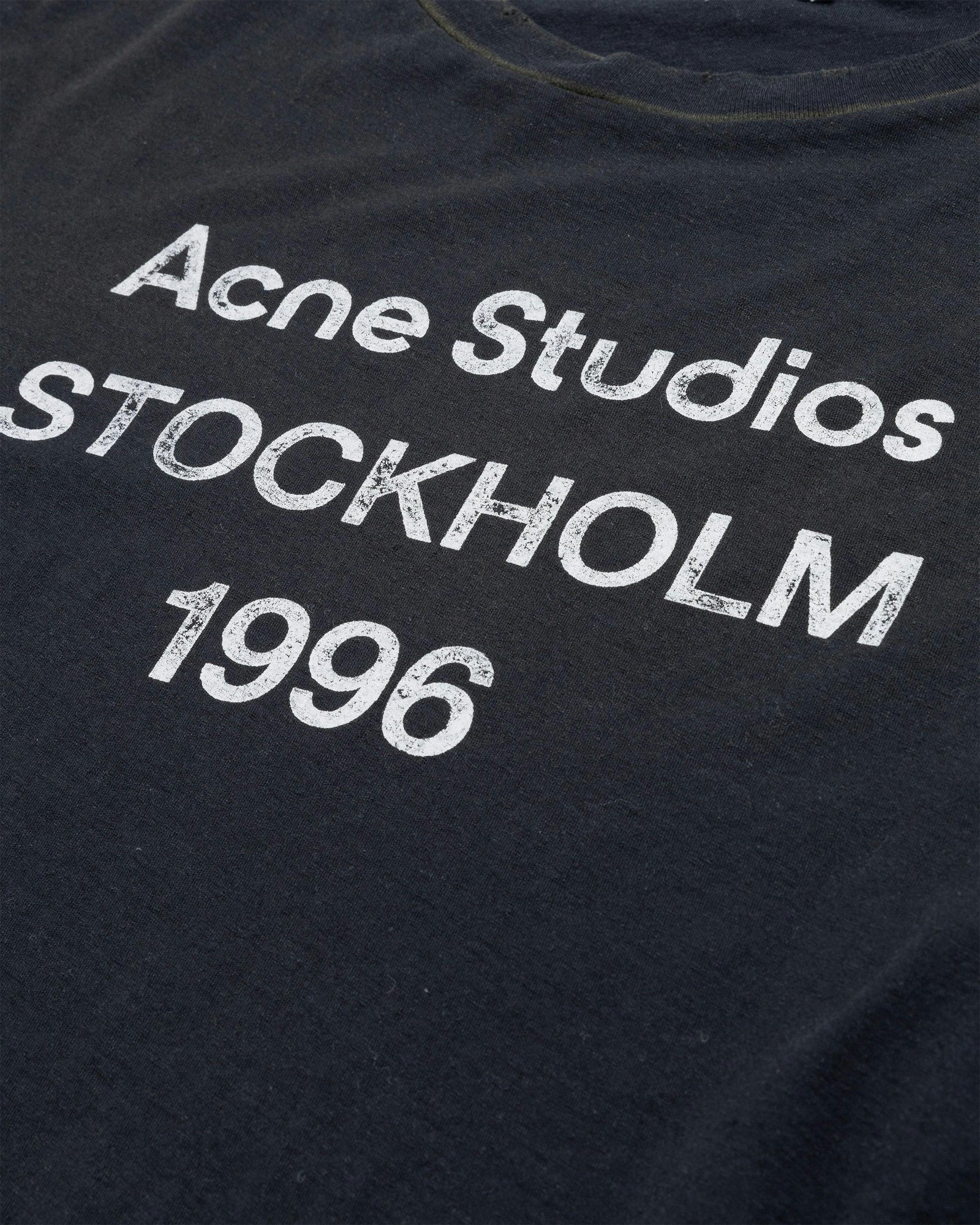 Logo, distressed collar and cotton-hemp texture on an Acne Studios shirt.