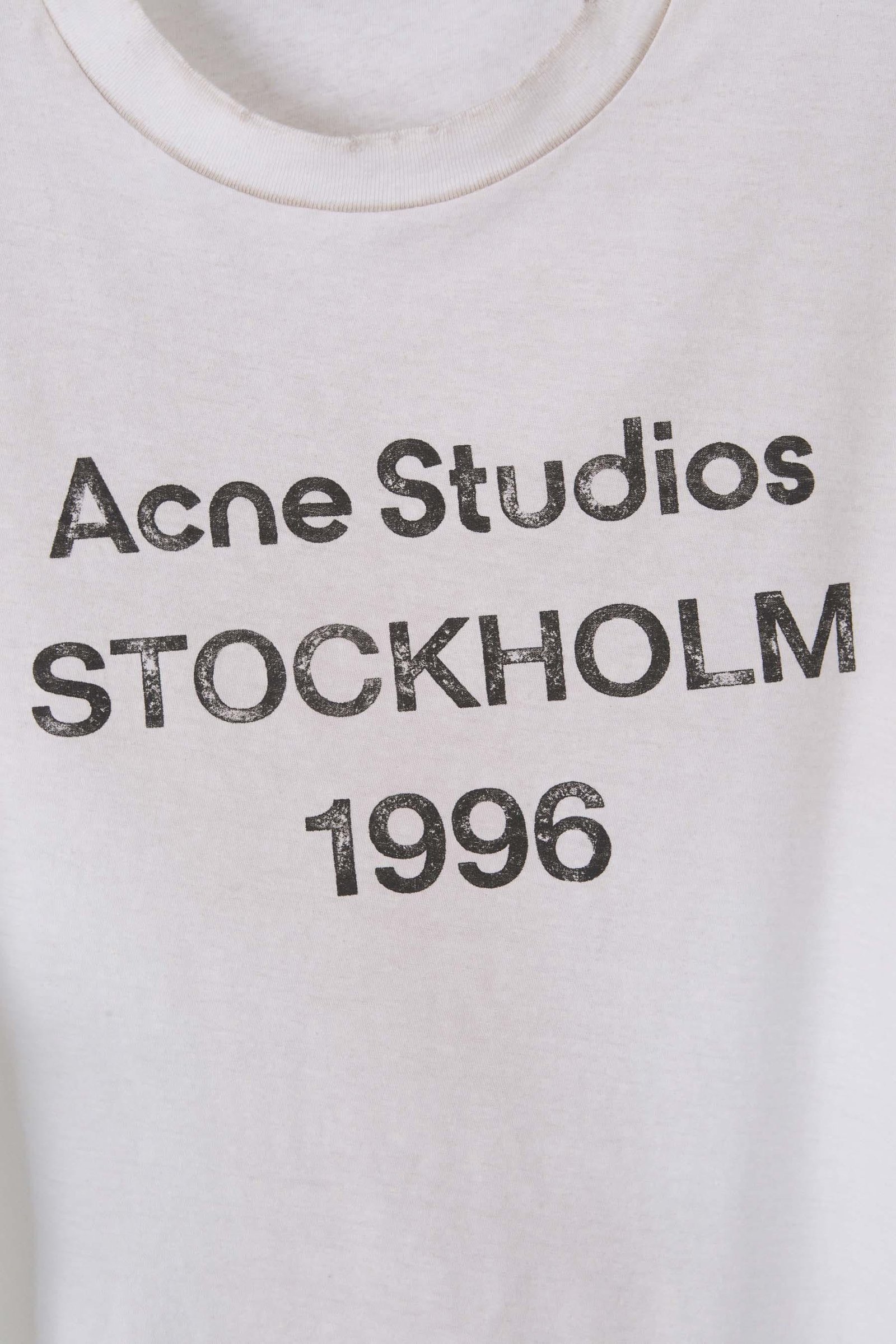 Close-up of Acne Studios cotton-hemp jersey and sprayed finish.
