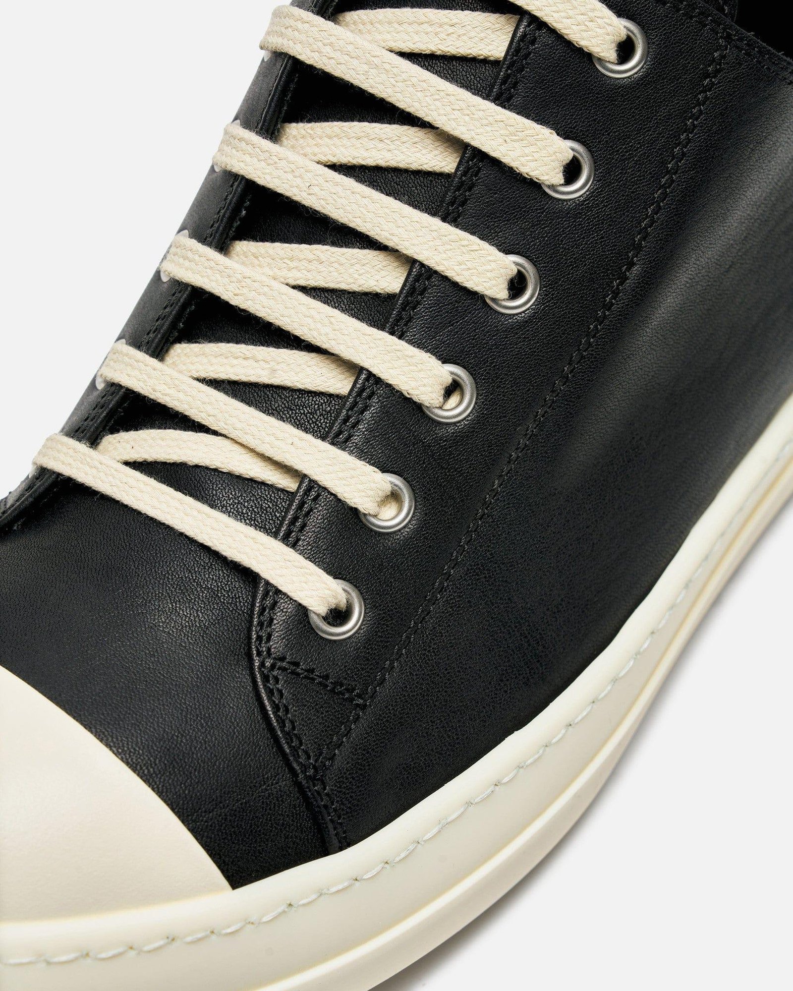 Leather Rick Owens shoes compared with DRKSHDW canvas sneakers.