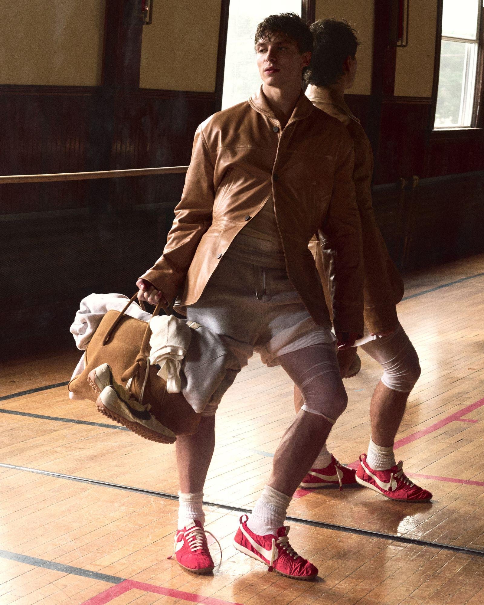 Jacquemus x Nike Moon Shoe worn as part of a fashion-led outfit.