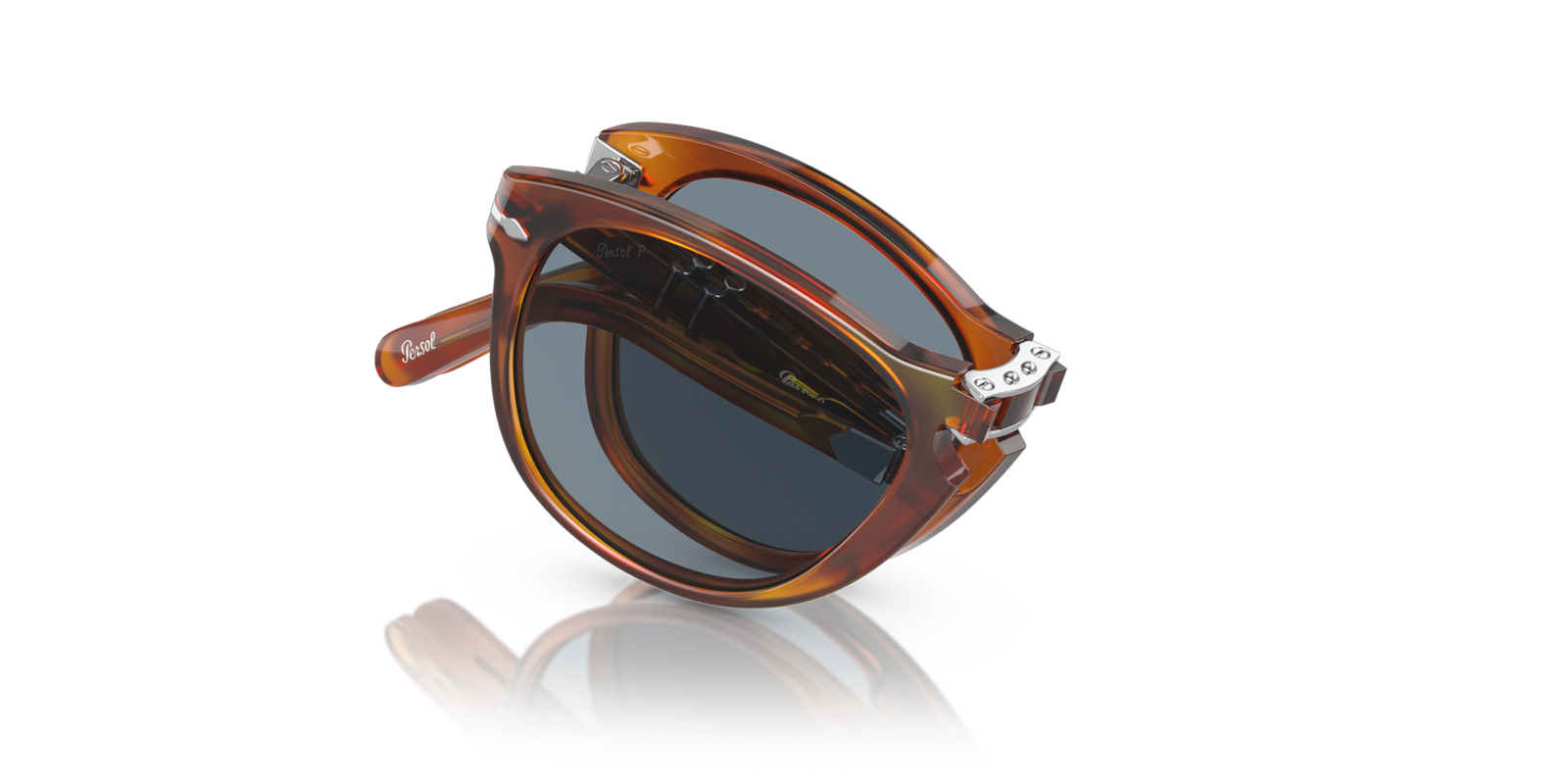 Folded Persol 714SM Steve McQueen sunglasses with blue lenses.