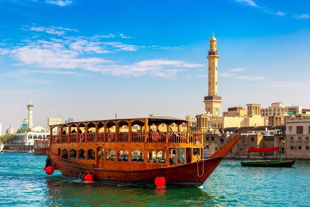 Traditional dhow on Dubai Creek in daylight