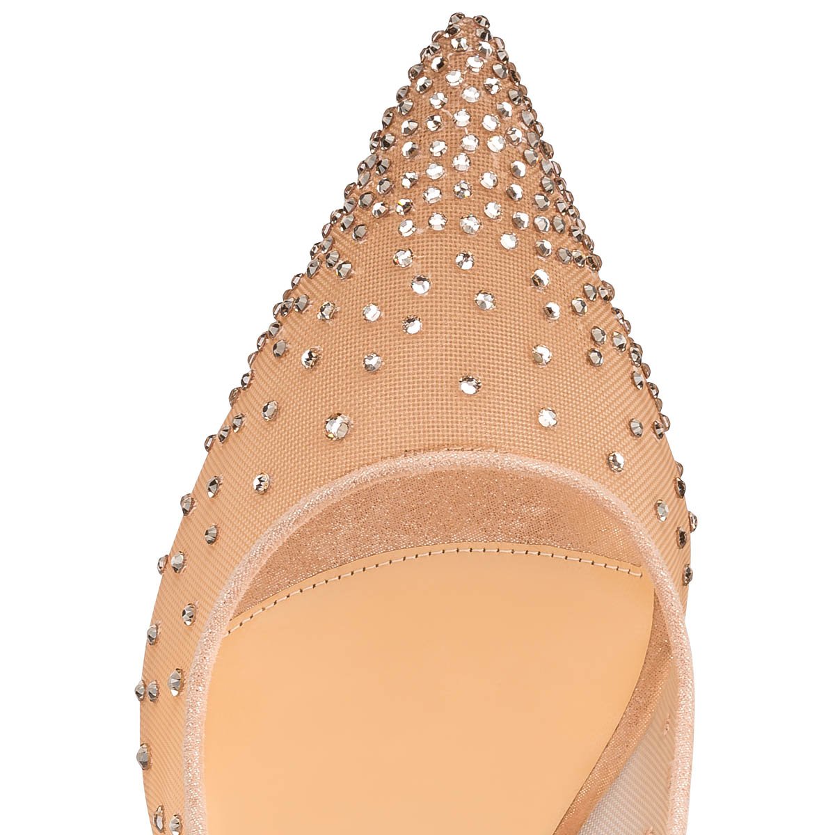 Close-up of crystal-embellished mesh pumps showing sheer textile and reinforcement