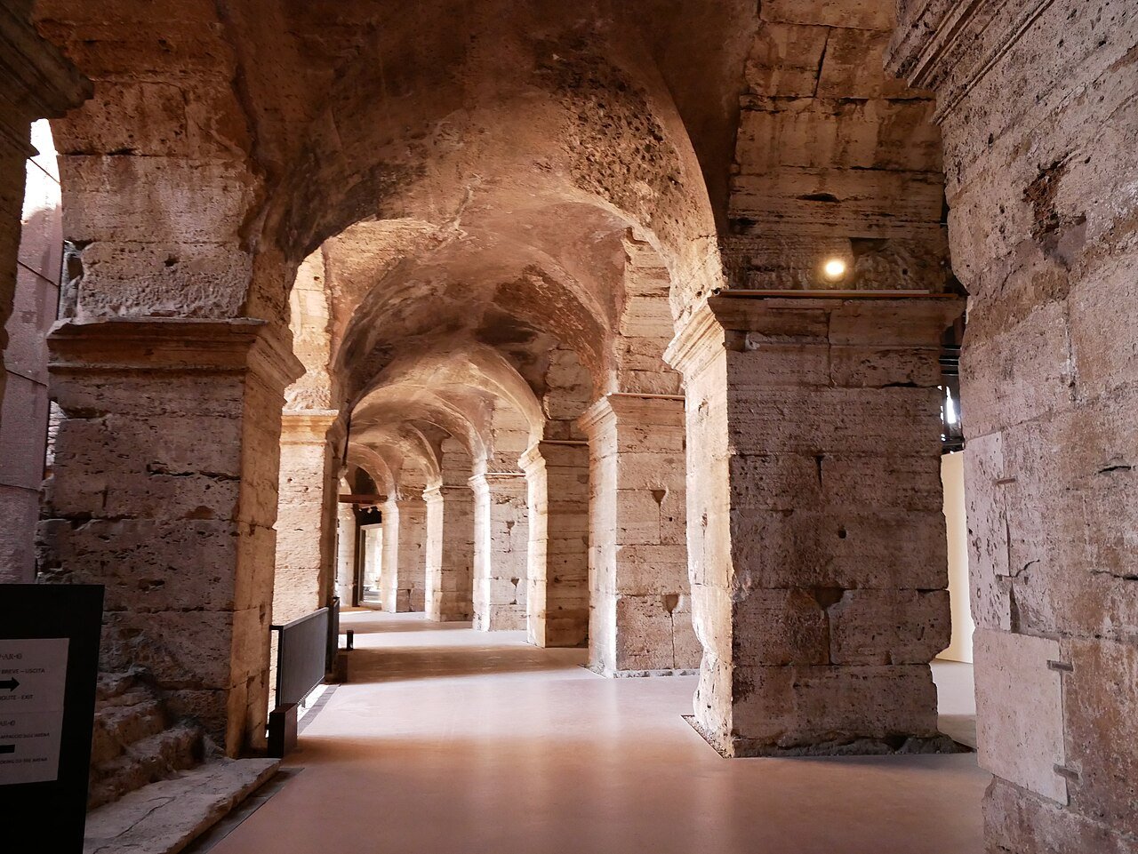 Stone corridors and arches inside the Colosseum.