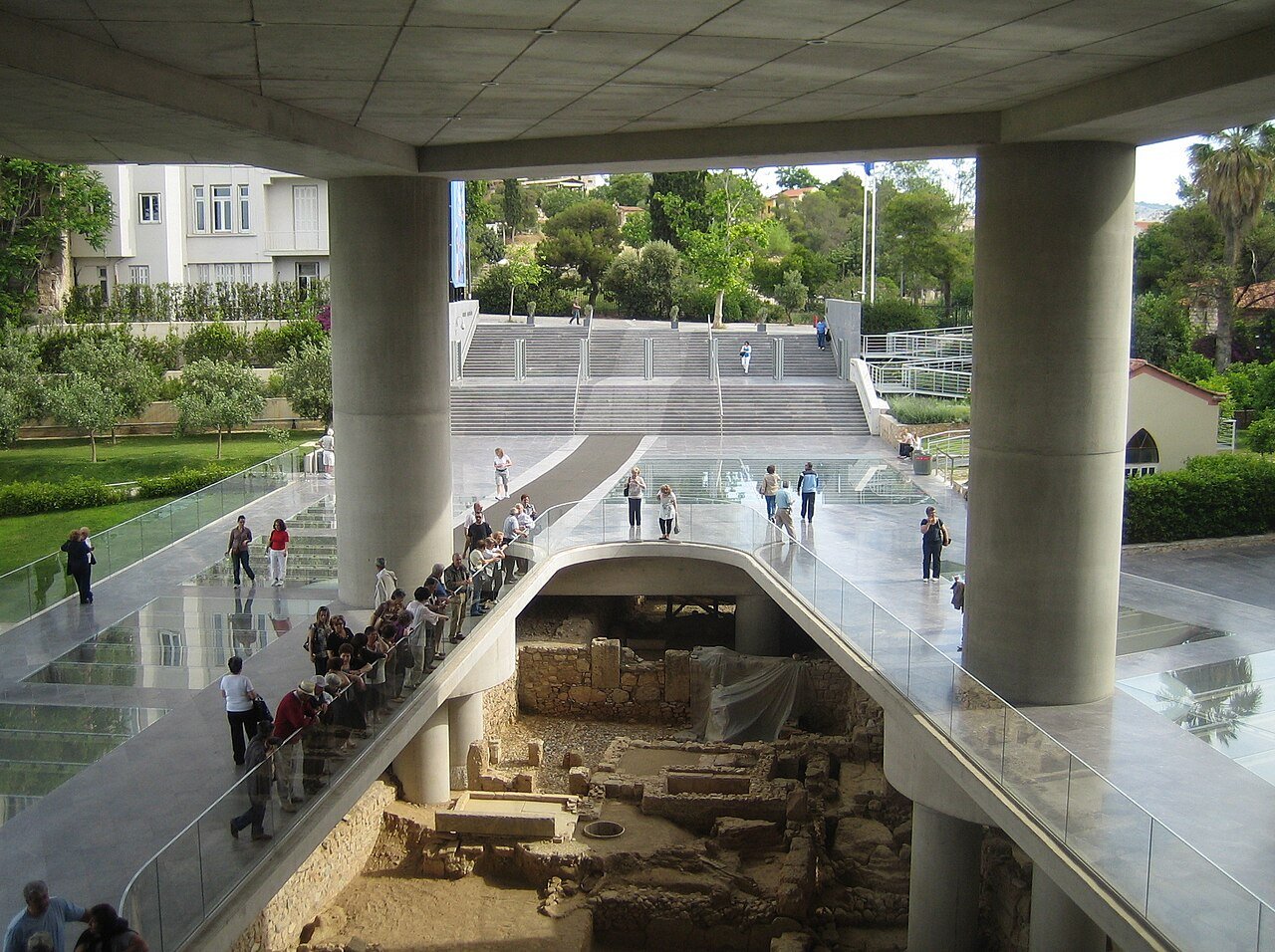 Visitors at the Acropolis Museum above excavated ancient remains.