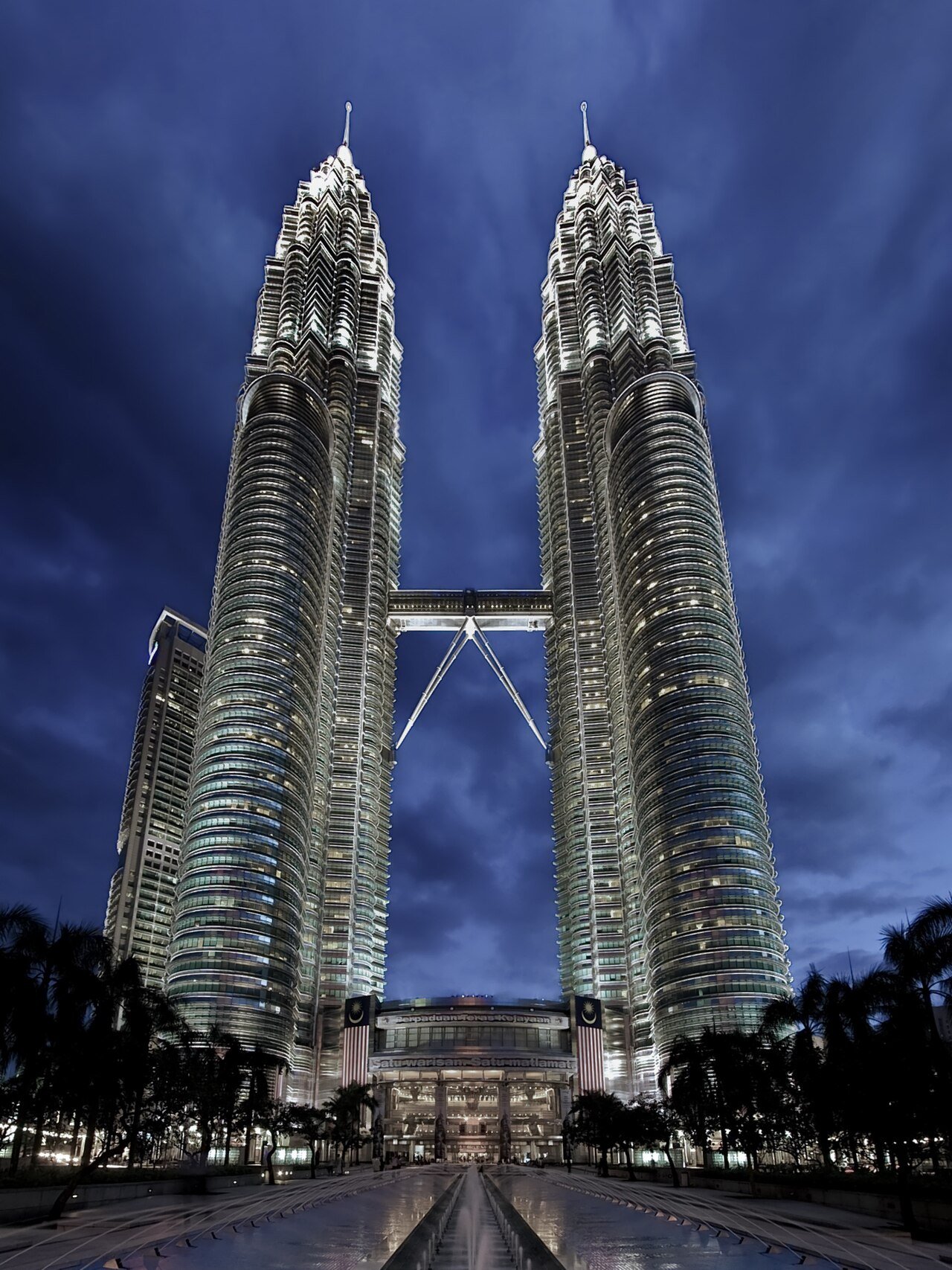 Illuminated Petronas Twin Towers and their connecting Skybridge in Kuala Lumpur, Malaysia.