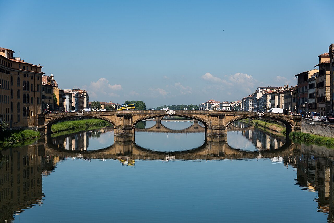 Ponte Santa Trinita and its reflection seen from Ponte Vecchio.