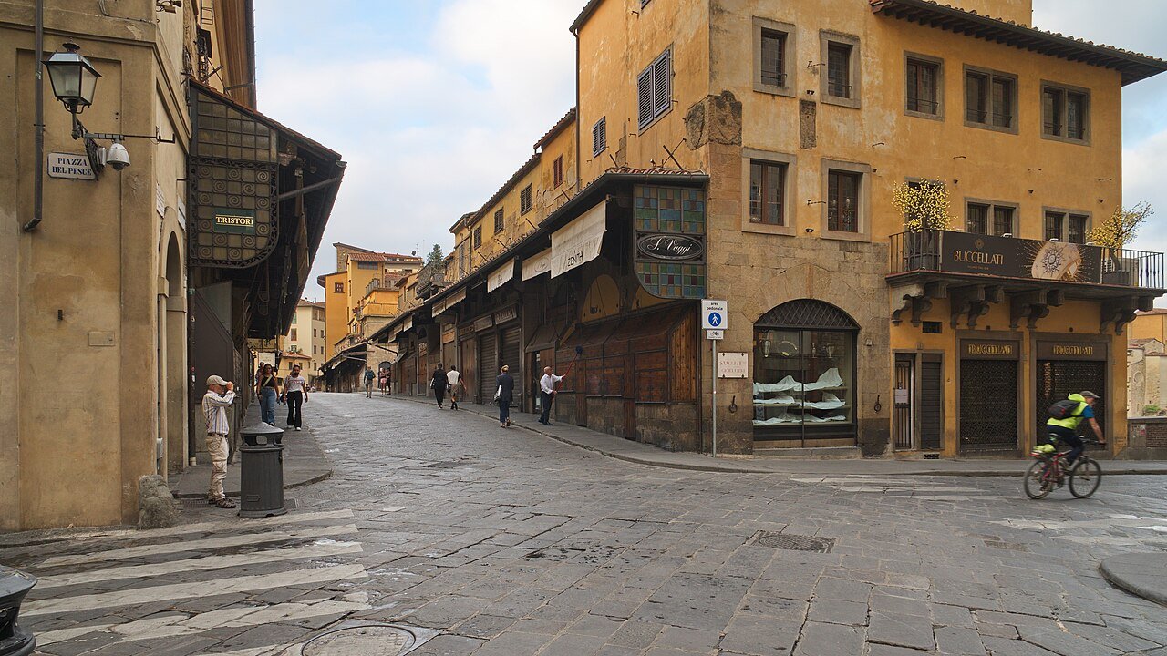 Pedestrian approach to Ponte Vecchio from Via Por Santa Maria.