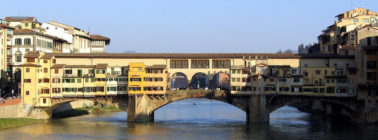 Ponte Vecchio and its shops above the Arno River.