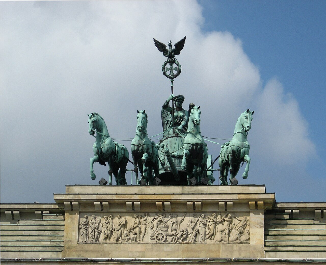 Daylight view of the Quadriga above Brandenburg Gate.