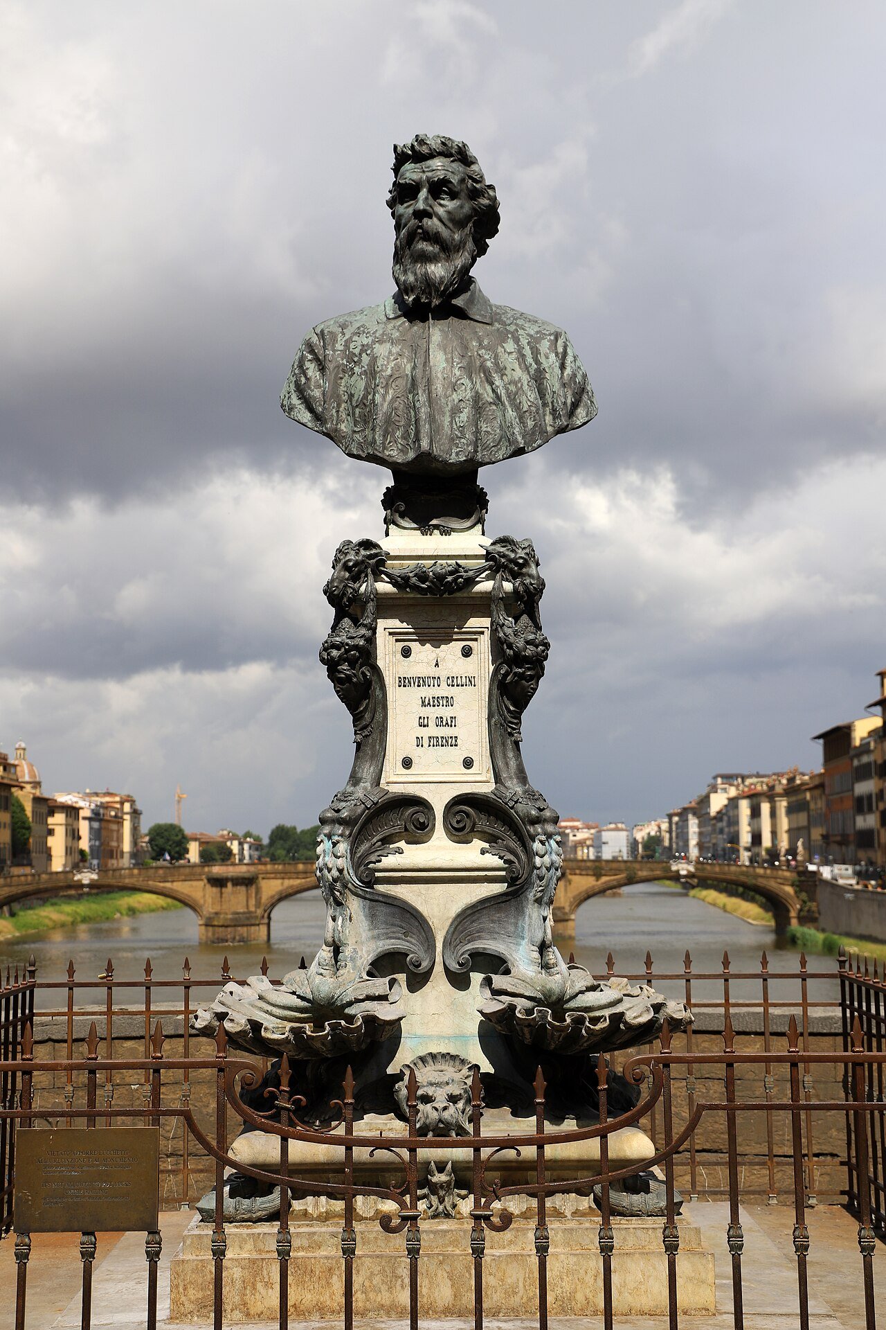 Monument to goldsmith Benvenuto Cellini on Ponte Vecchio.