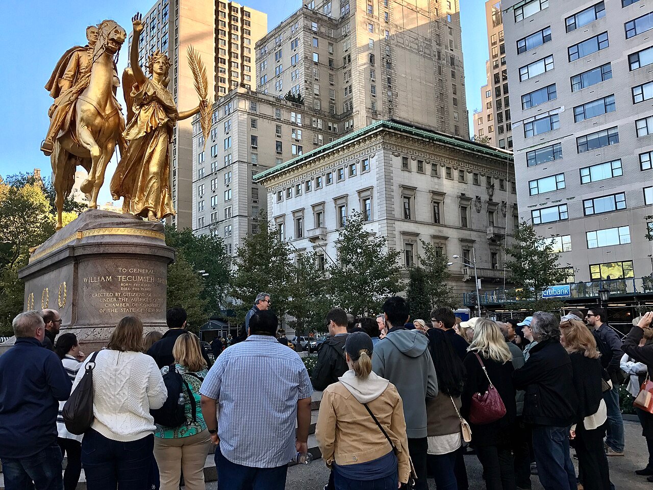Visitors gathered at the Sherman Monument near Fifth Avenue.