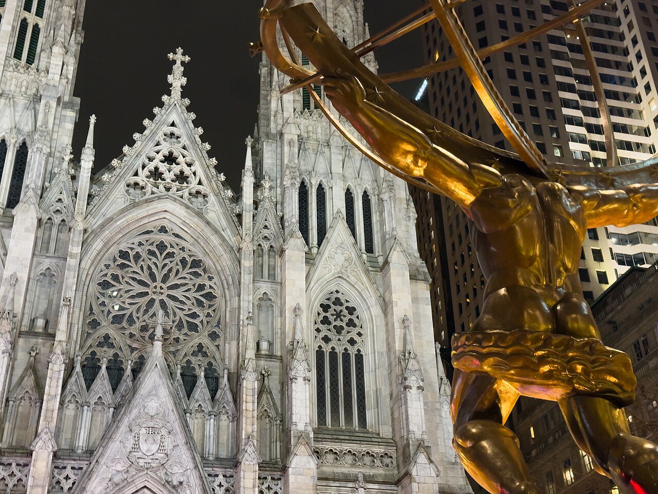 St. Patrick’s Cathedral and Midtown buildings with holiday decorations.