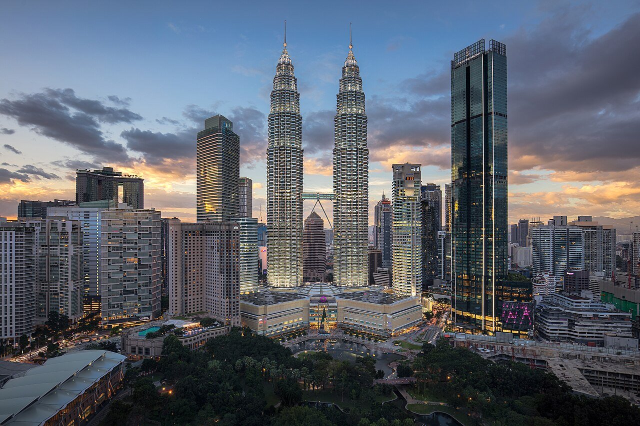 Petronas Twin Towers above the surrounding Kuala Lumpur city centre.