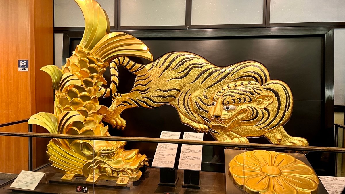 Gold roof ornaments displayed inside Osaka Castle Museum
