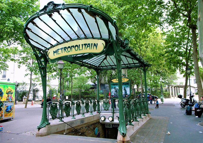 Paris Métro entrance on a city street.