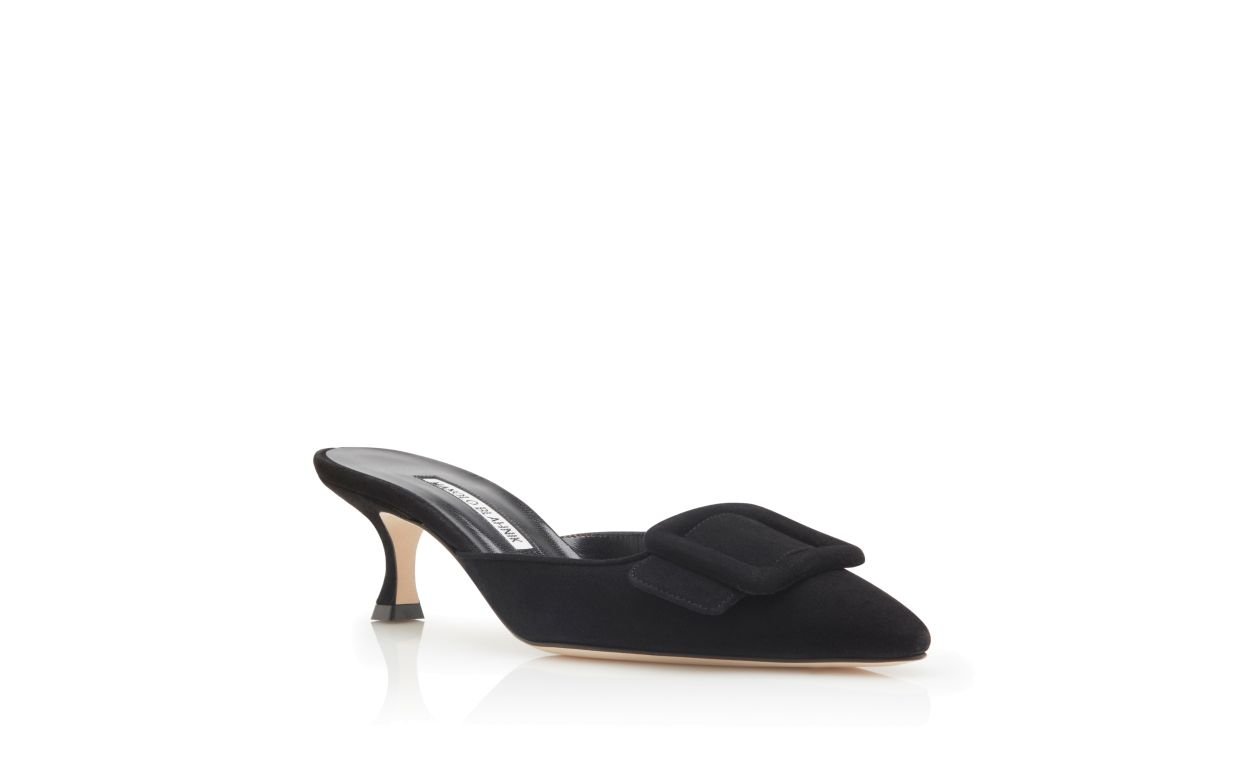 Black suede upper and buckle on Manolo Blahnik Maysale mules.