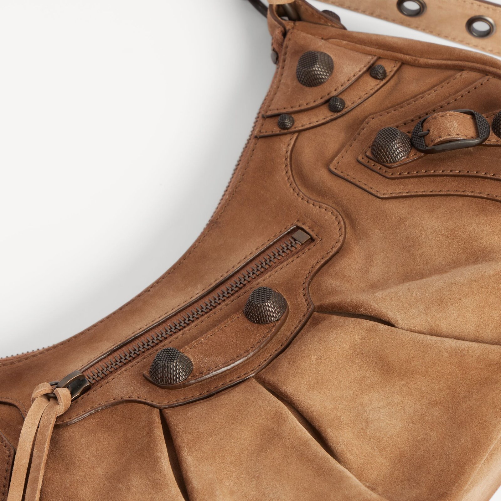 Camel waxed suede calfskin and brass hardware on the Le Cagole Small.