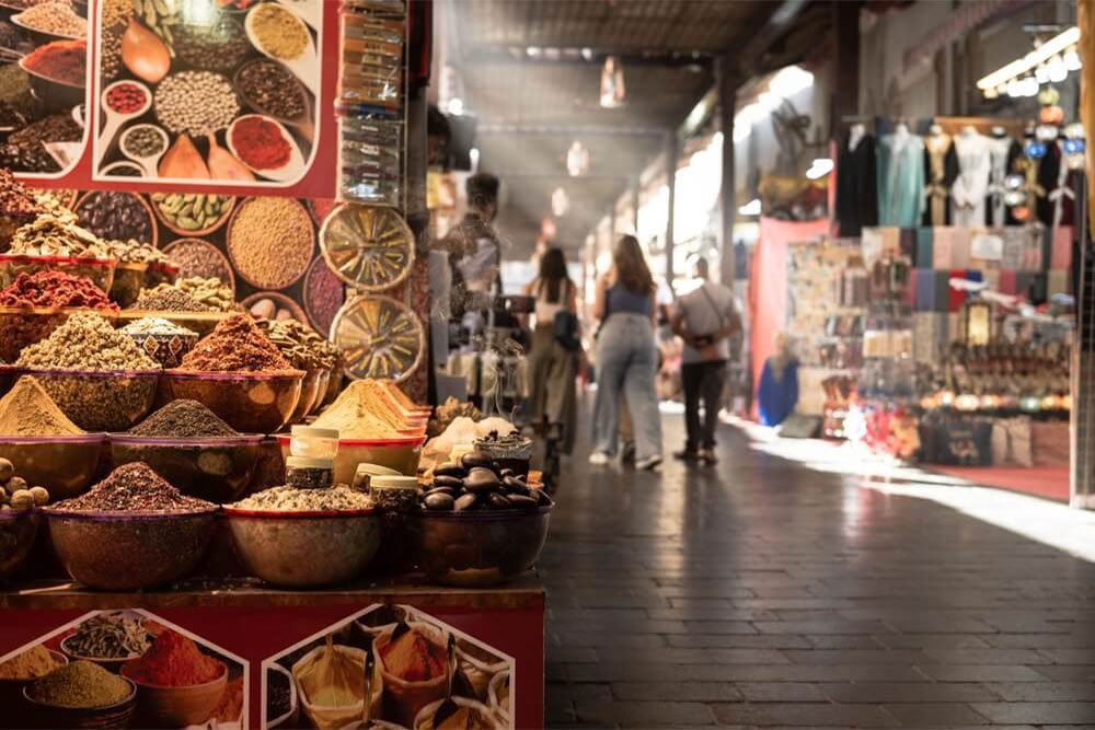 Spice displays and a market lane in Old Dubai