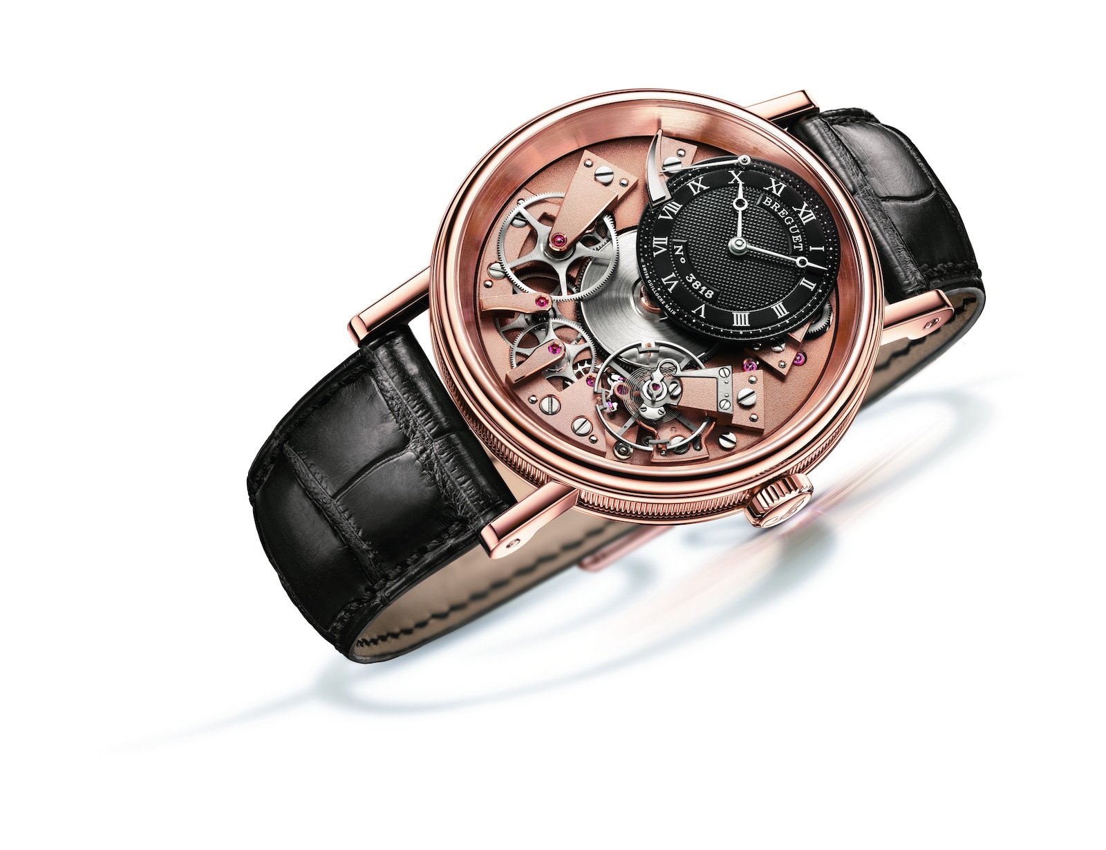 Breguet Tradition 7057 with open-tipped hands, a fluted rose-gold case and exposed mechanics.