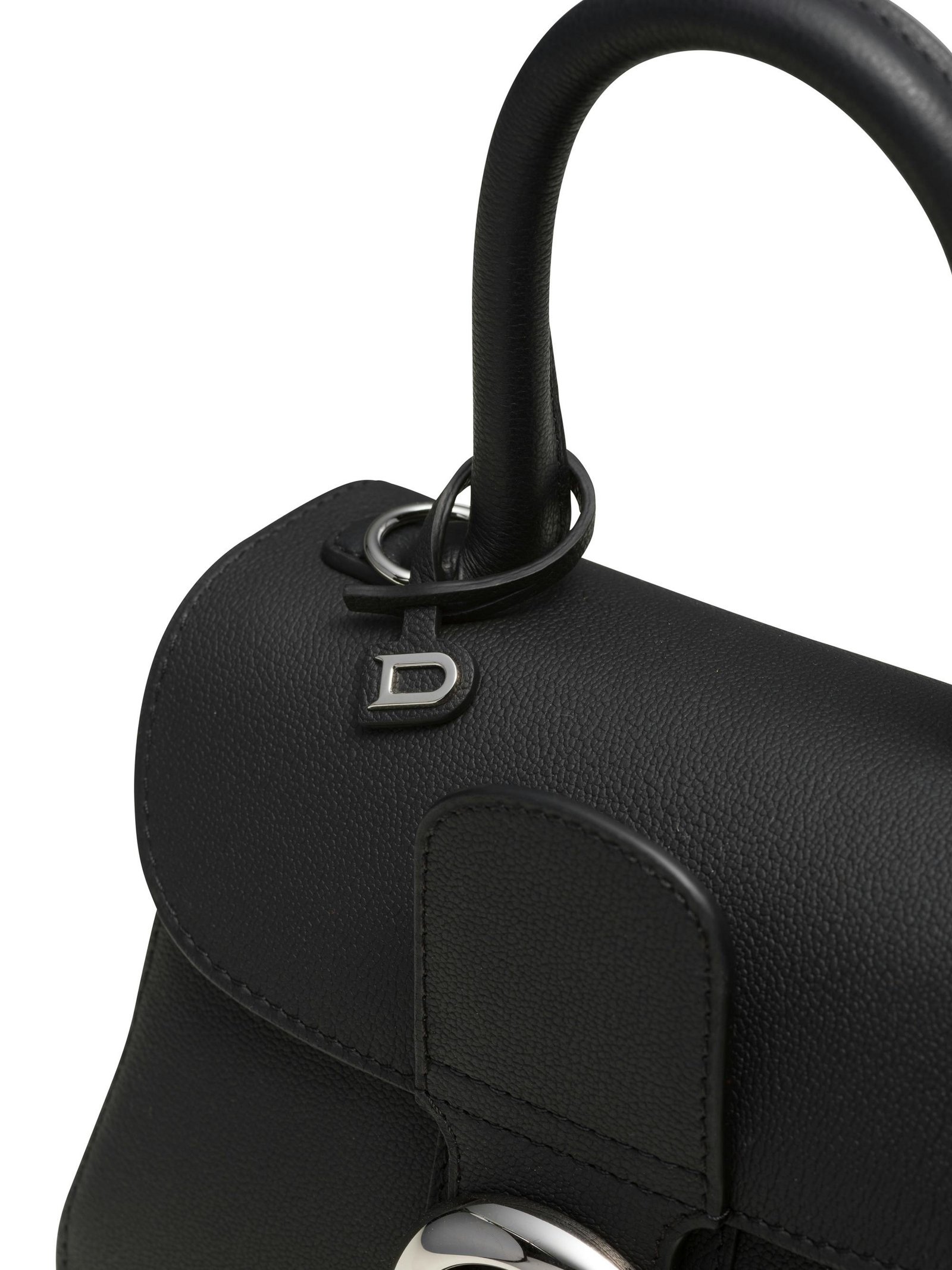 Close-up of grained black Rodéo leather on the Brillant Mini.