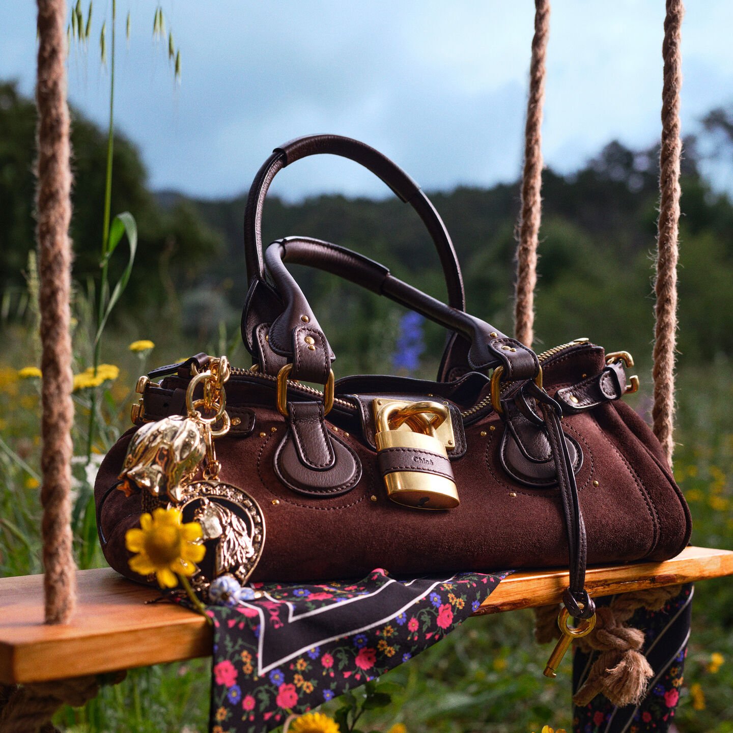 Chloé Winter 2026 accessories arranged in a still-life composition