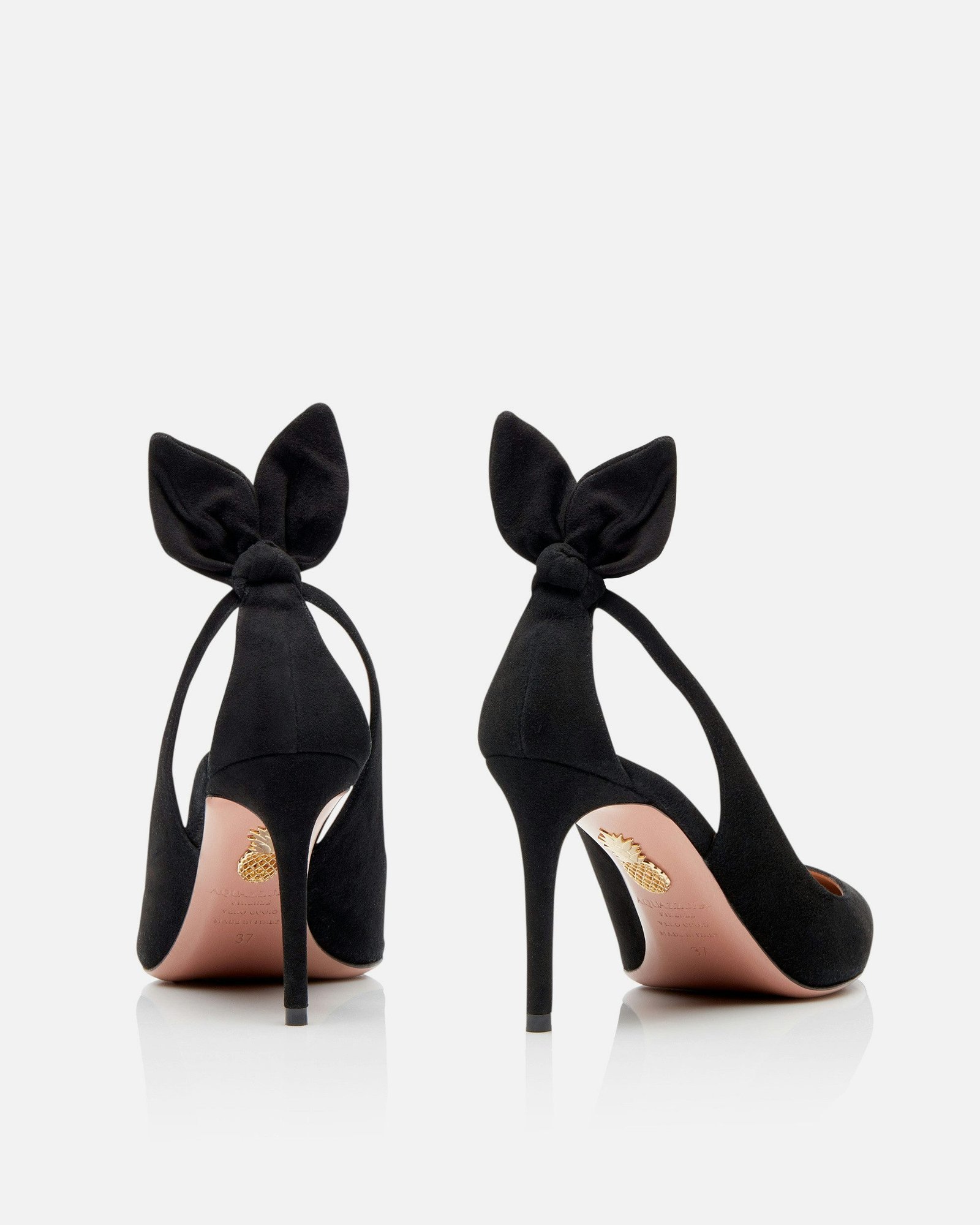 Rear view of black suede Aquazzura Bow Tie pumps and their bows.
