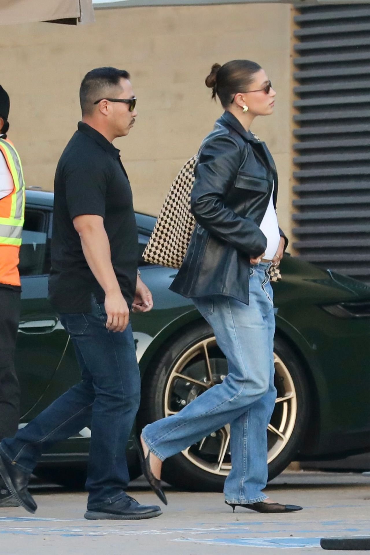 Mesh heels worn with blue jeans and a dark jacket