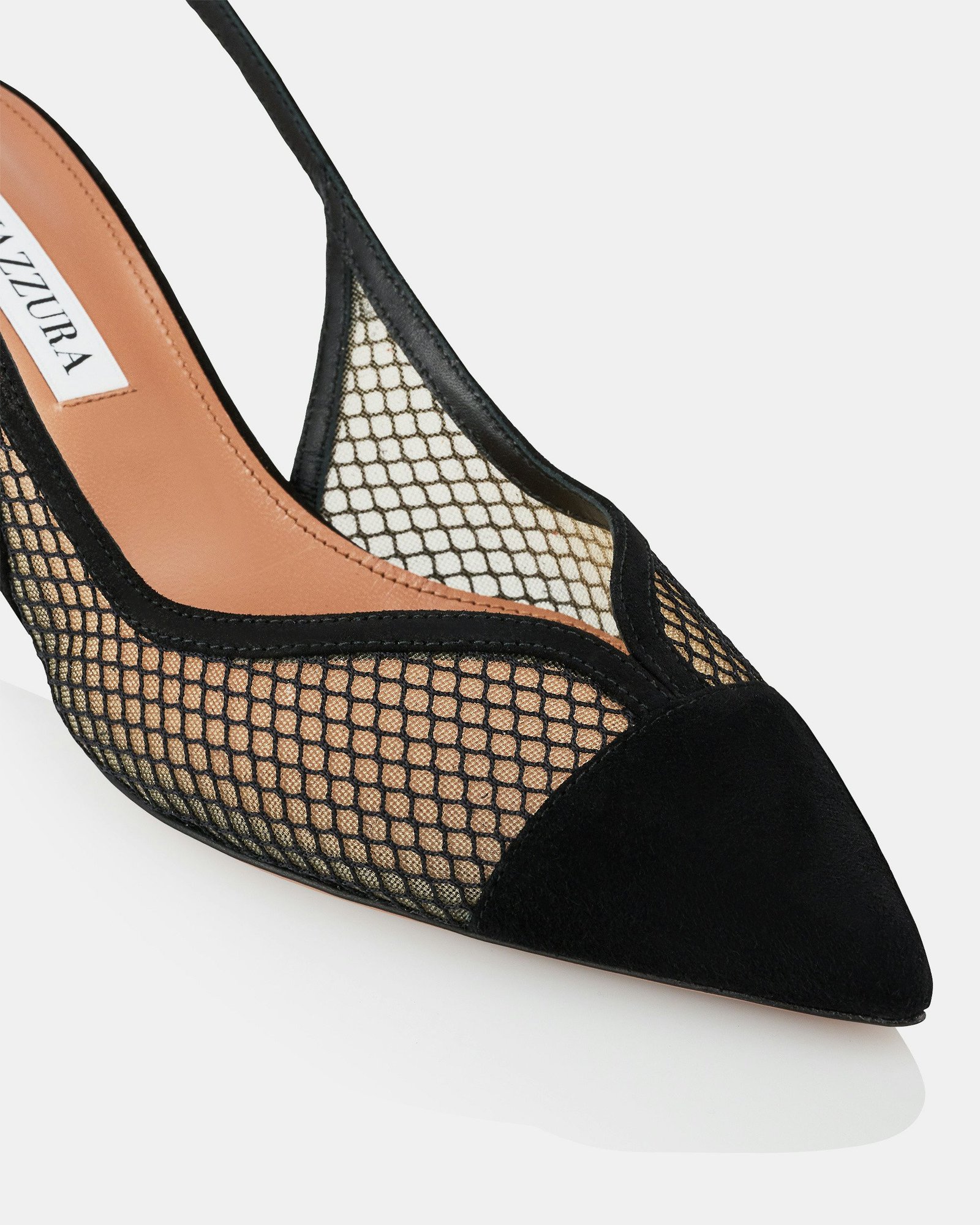 Close-up of black mesh slingback uppers and suede toe panels