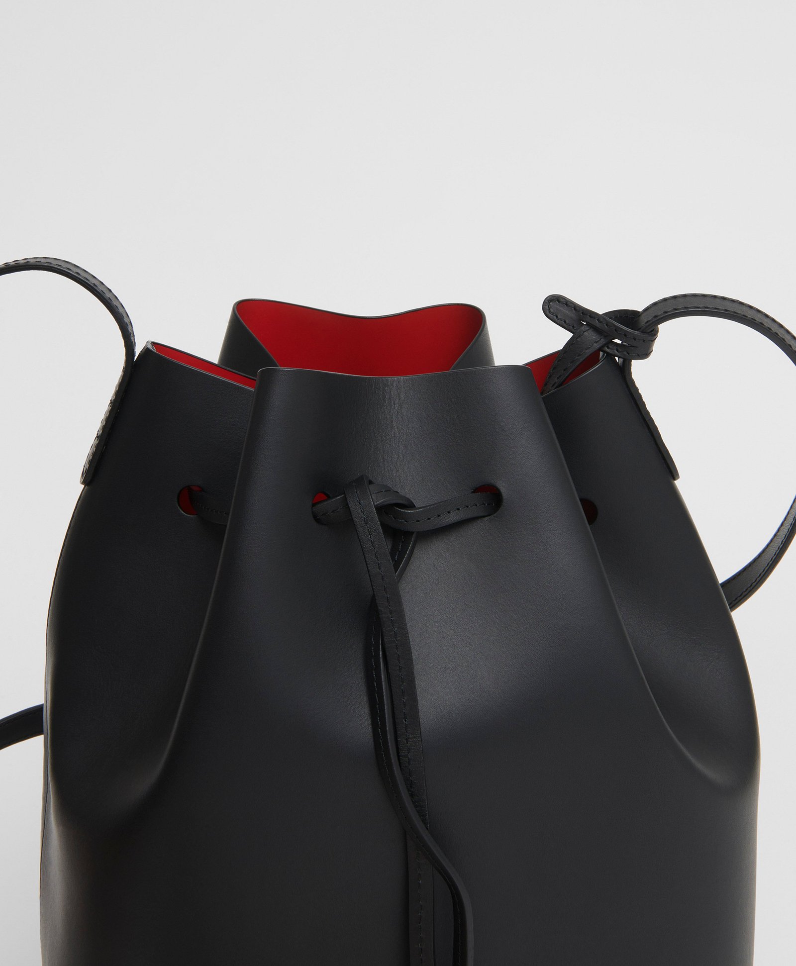 Close view of black vegetable-tanned Bucket Bag leather and drawstring