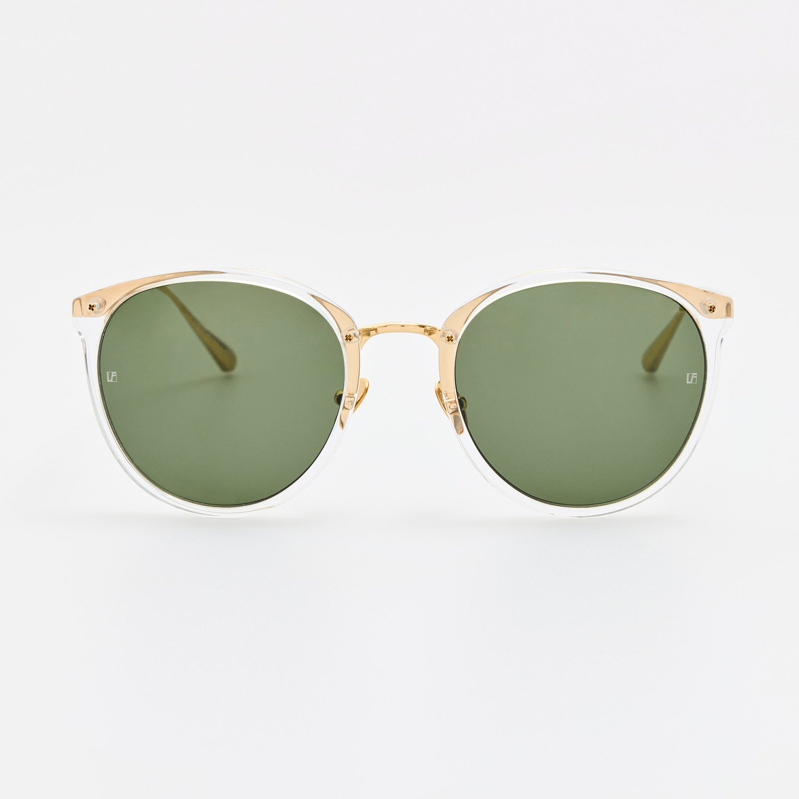 Linda Farrow Calthorpe sunglasses in clear acetate and gold-plated titanium with green lenses.