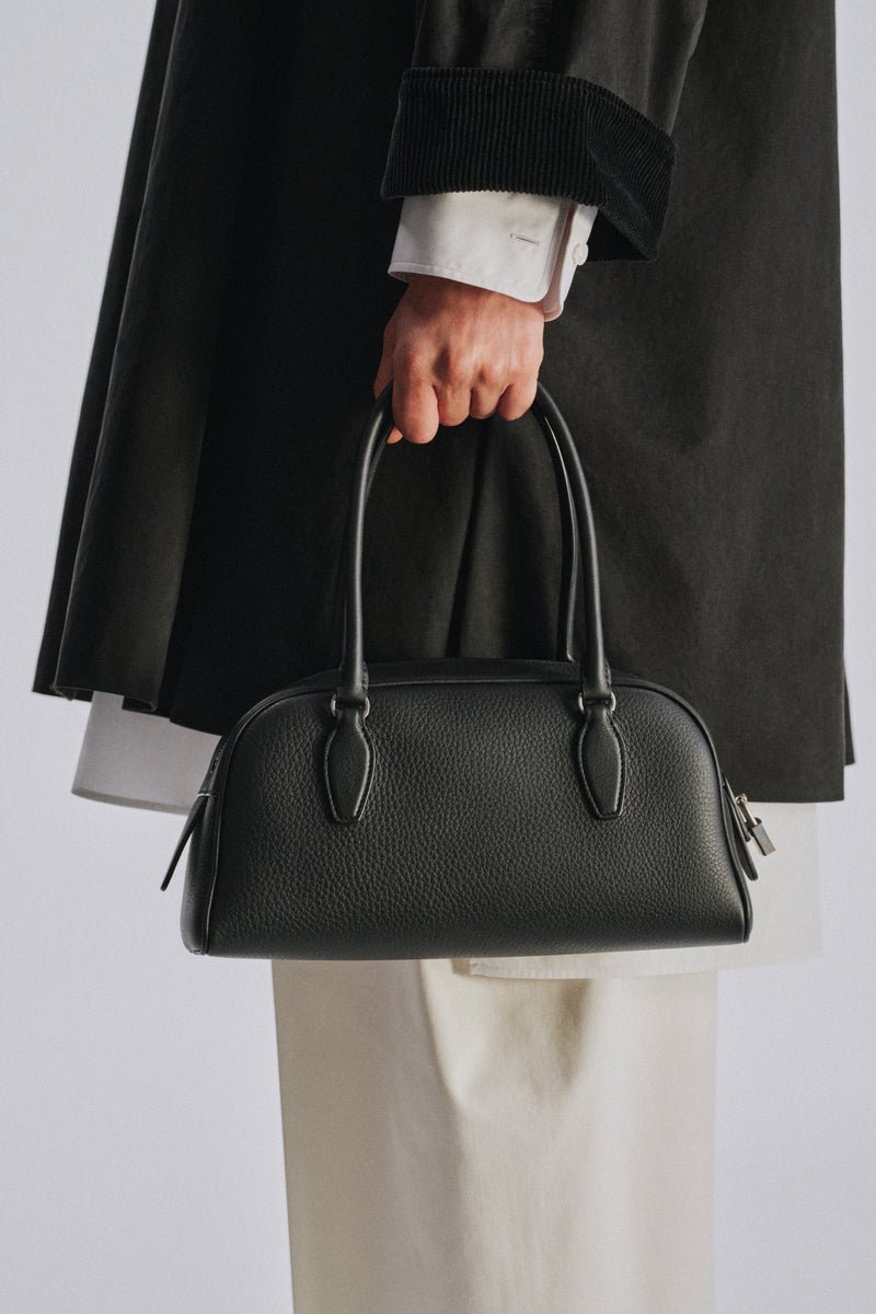The Row Small E/W India styled in an editorial look.
