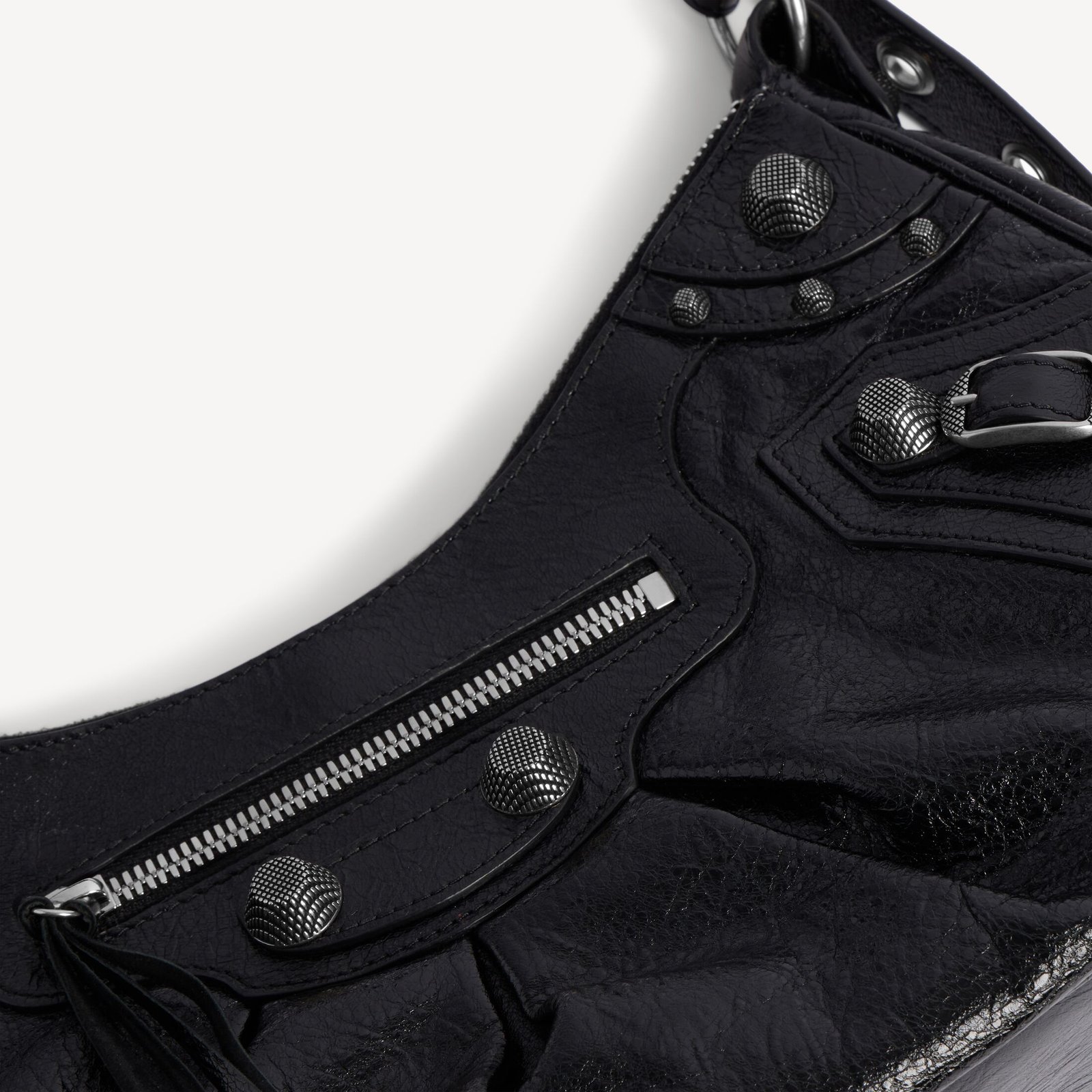 Balenciaga Le Cagole bag details with studs, buckles and leather pullers.