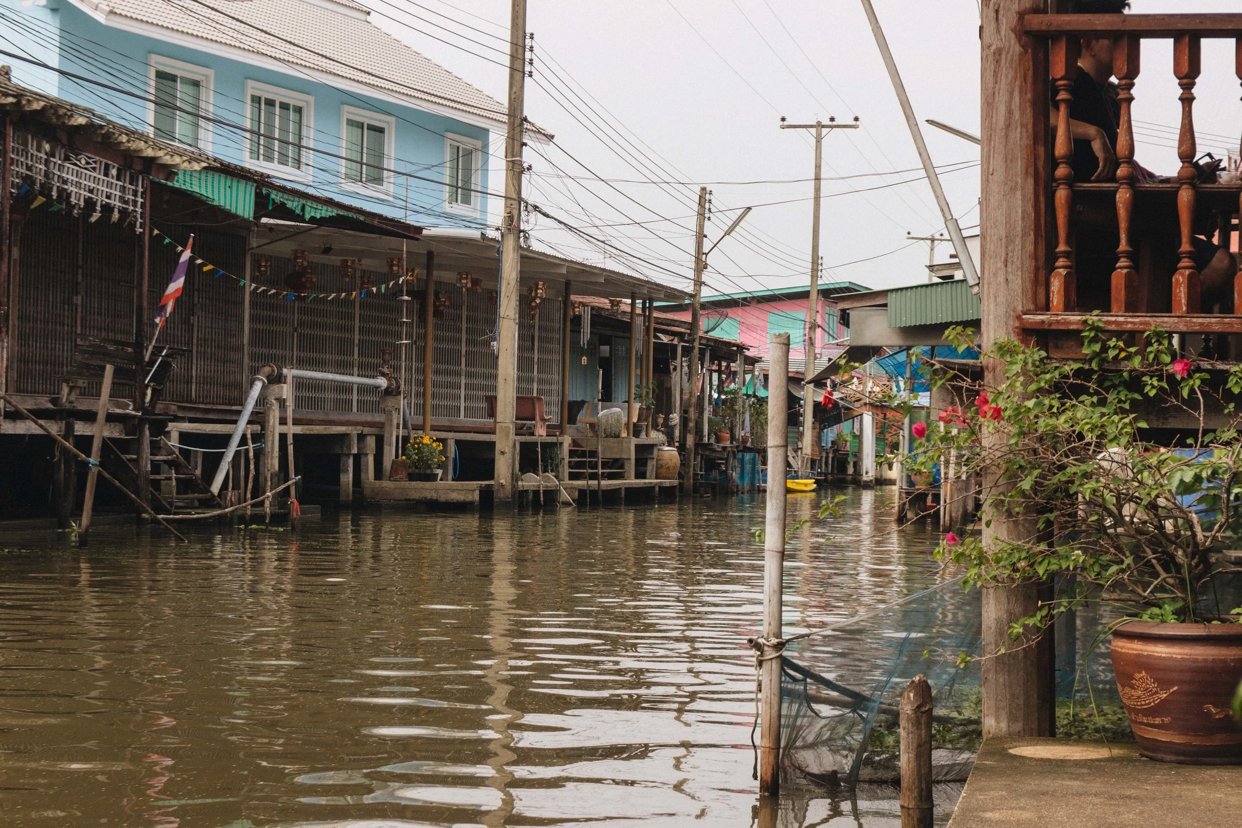 Canal-side houses around Damnoen Saduak Floating Market.