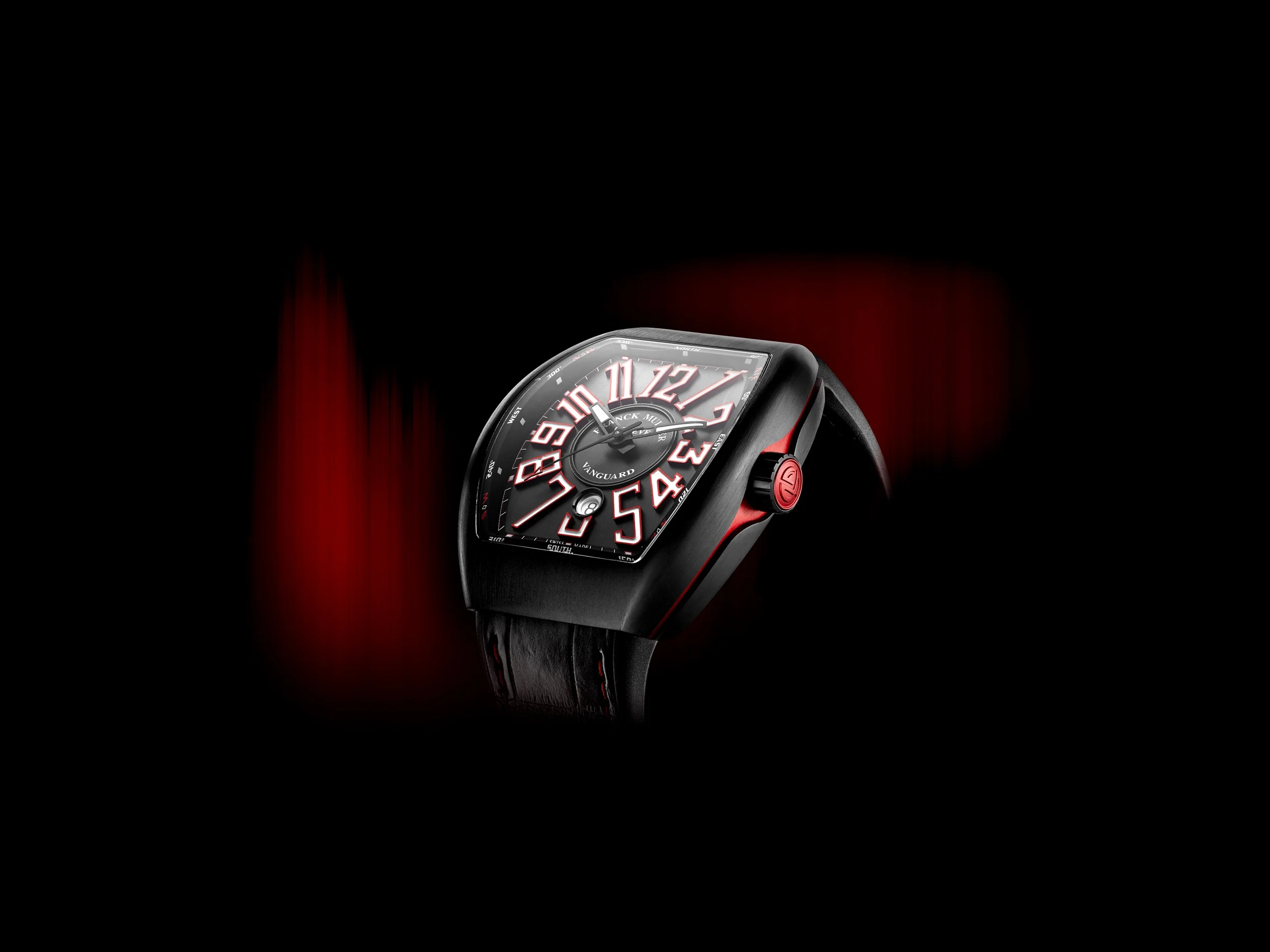 Dark Franck Muller Vanguard with bold numerals and a curved case.