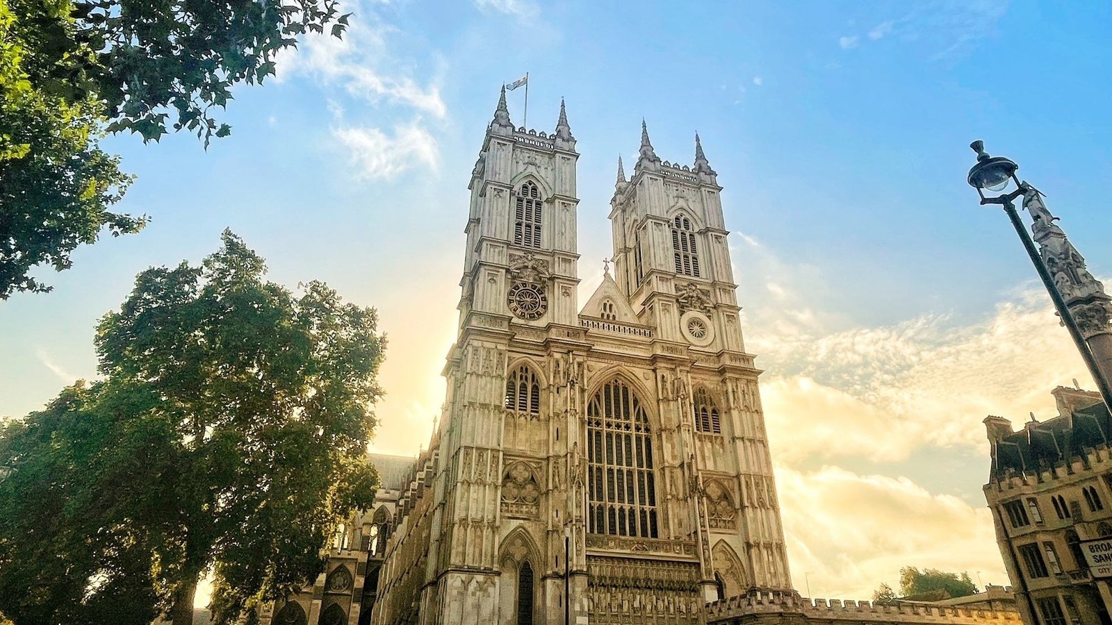 Westminster Abbey’s western towers in warm sunlight.