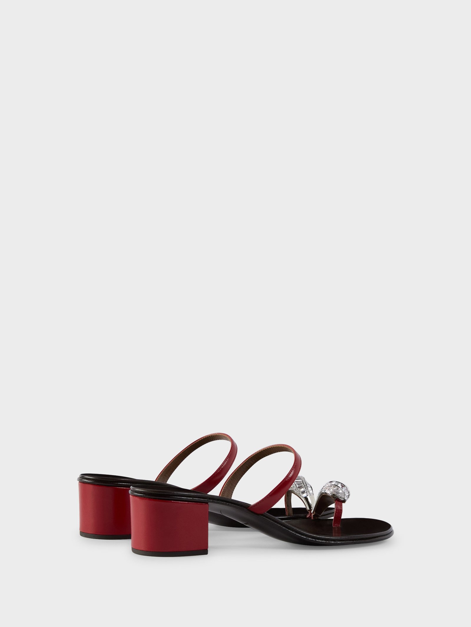 Side and rear view of Giuseppe Zanotti Icon Ring sandals with low block heels.