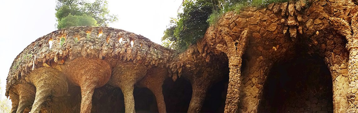 Slanting stone columns and wave-like vaults of the Laundry Room Portico.