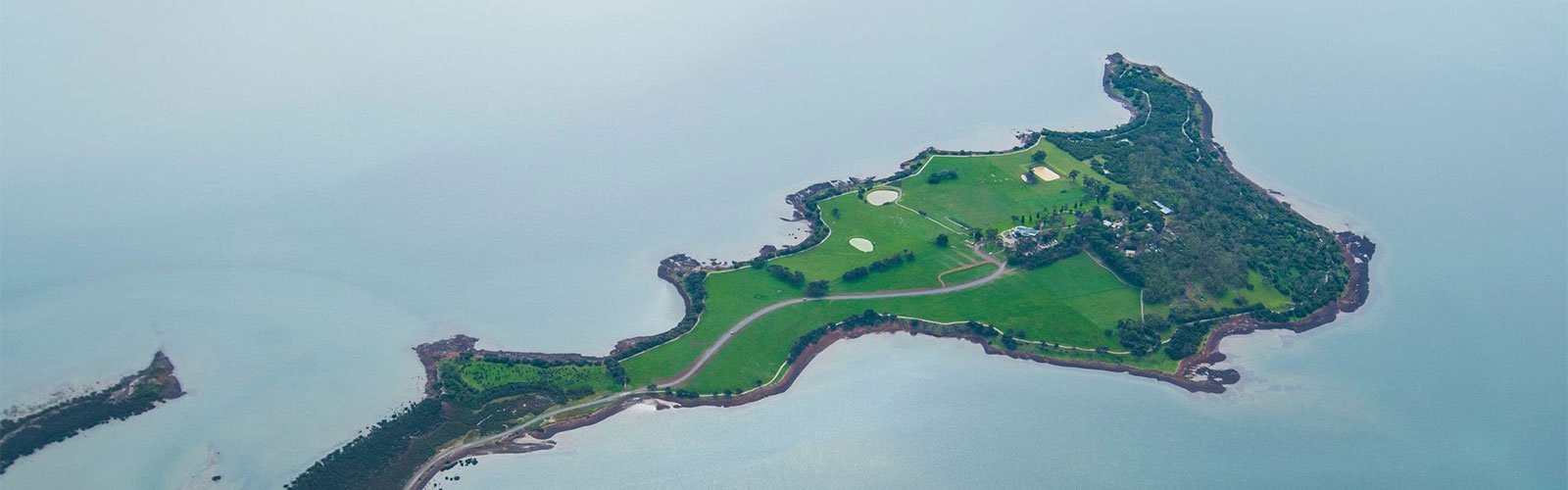Aerial view of Churchill Island and its surrounding coastal landscape.