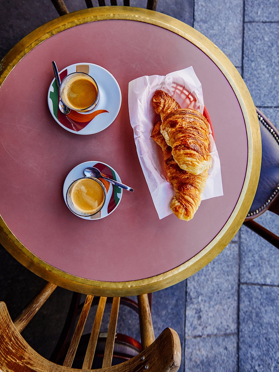 Croissant and coffee on a Paris café terrace.