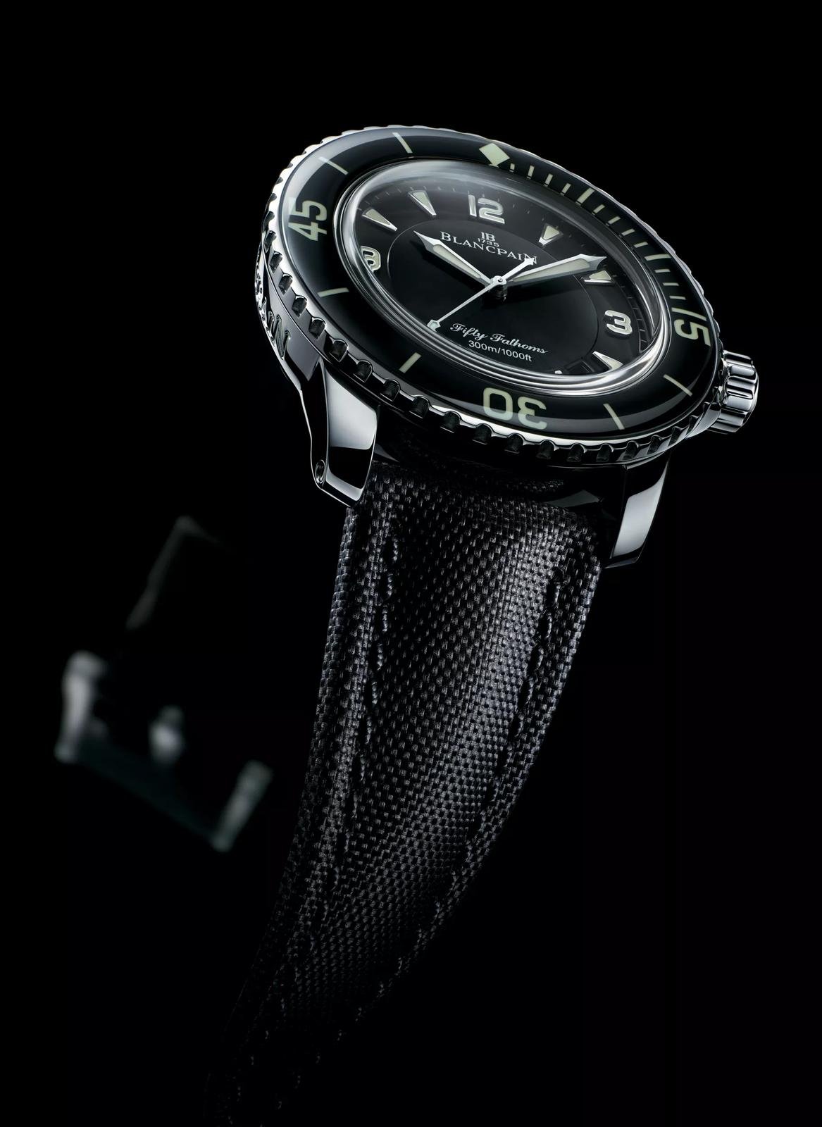 Blancpain Fifty Fathoms Automatique with black dial and sapphire-topped bezel.