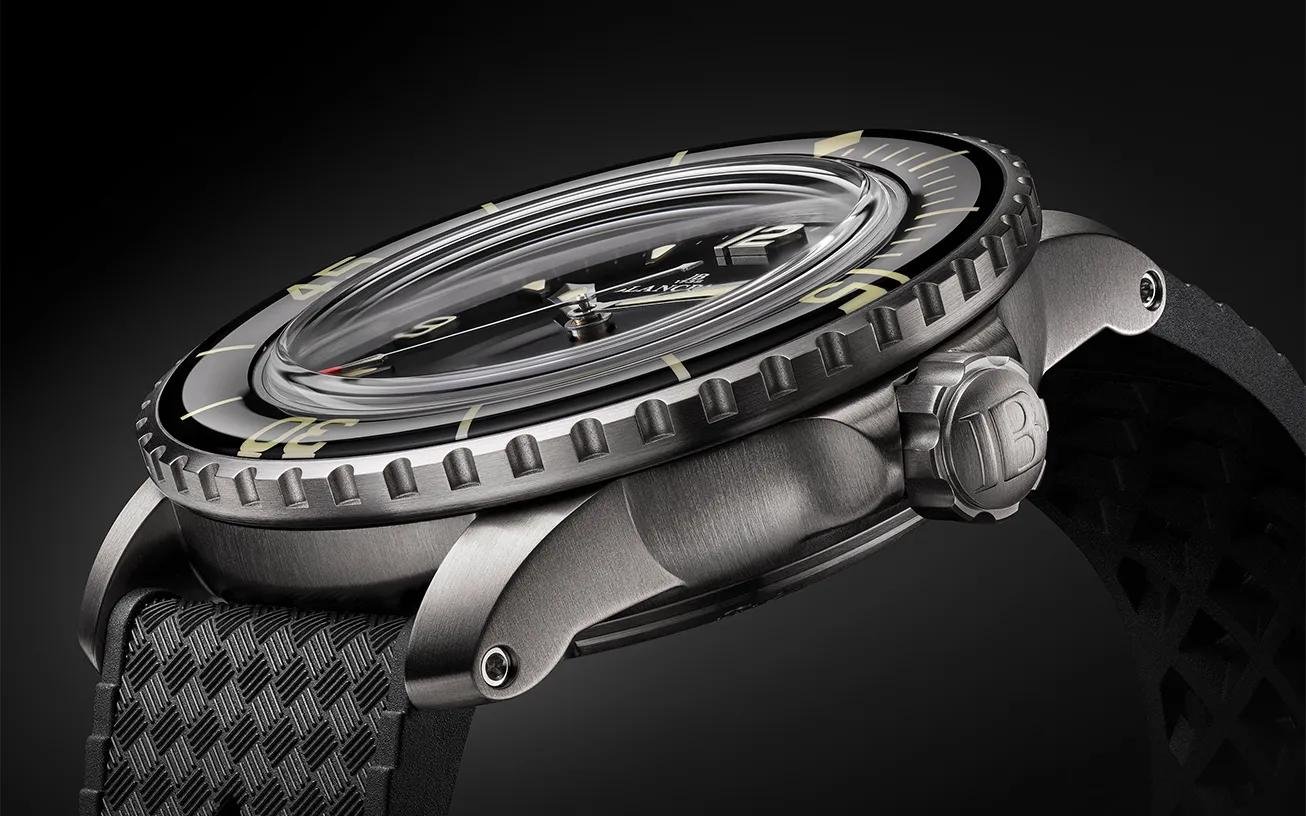 Side view of the titanium Fifty Fathoms Automatique case, crown and sapphire bezel.