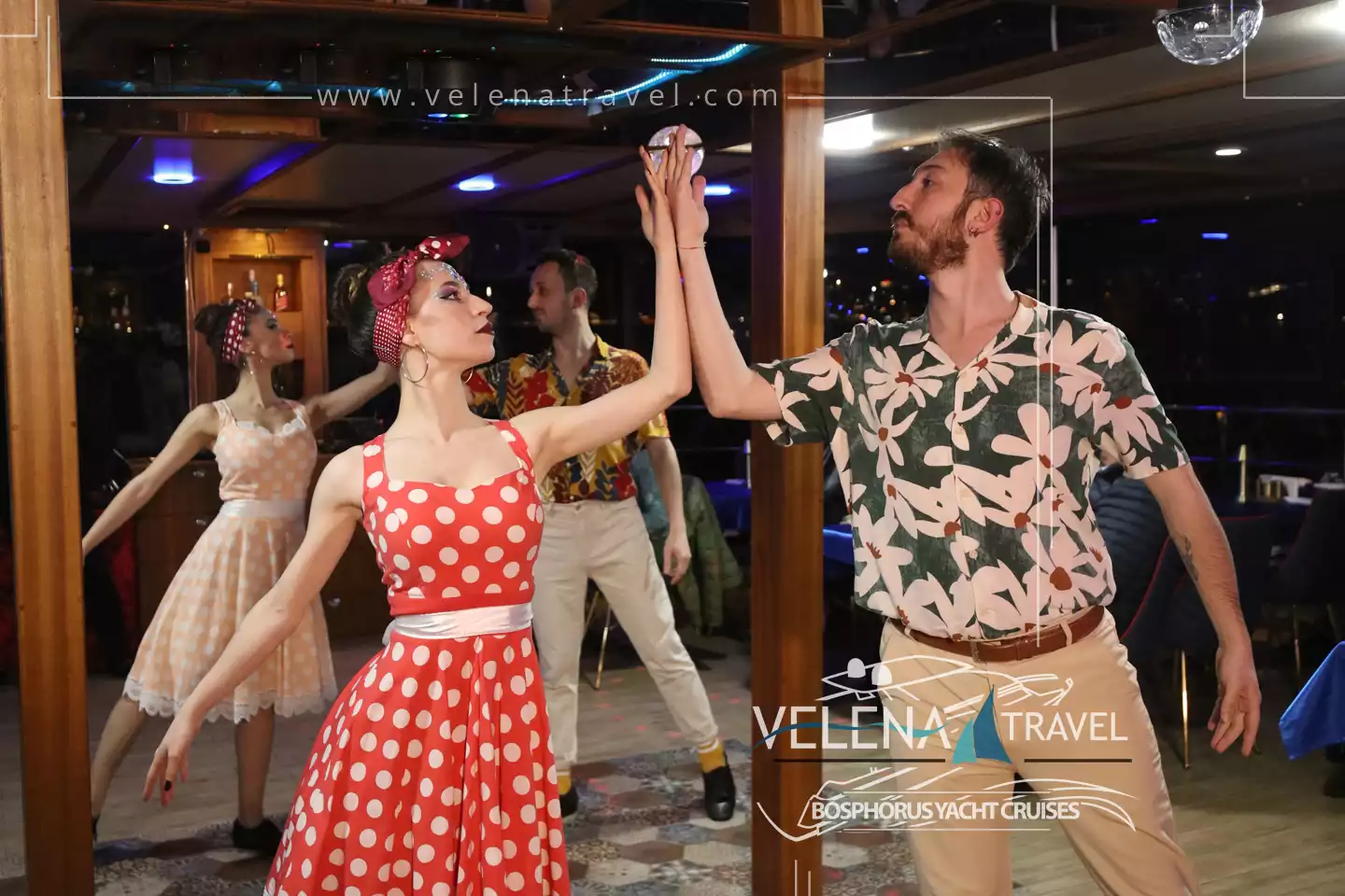Guests taking part in live entertainment aboard a Bosphorus dinner cruise.
