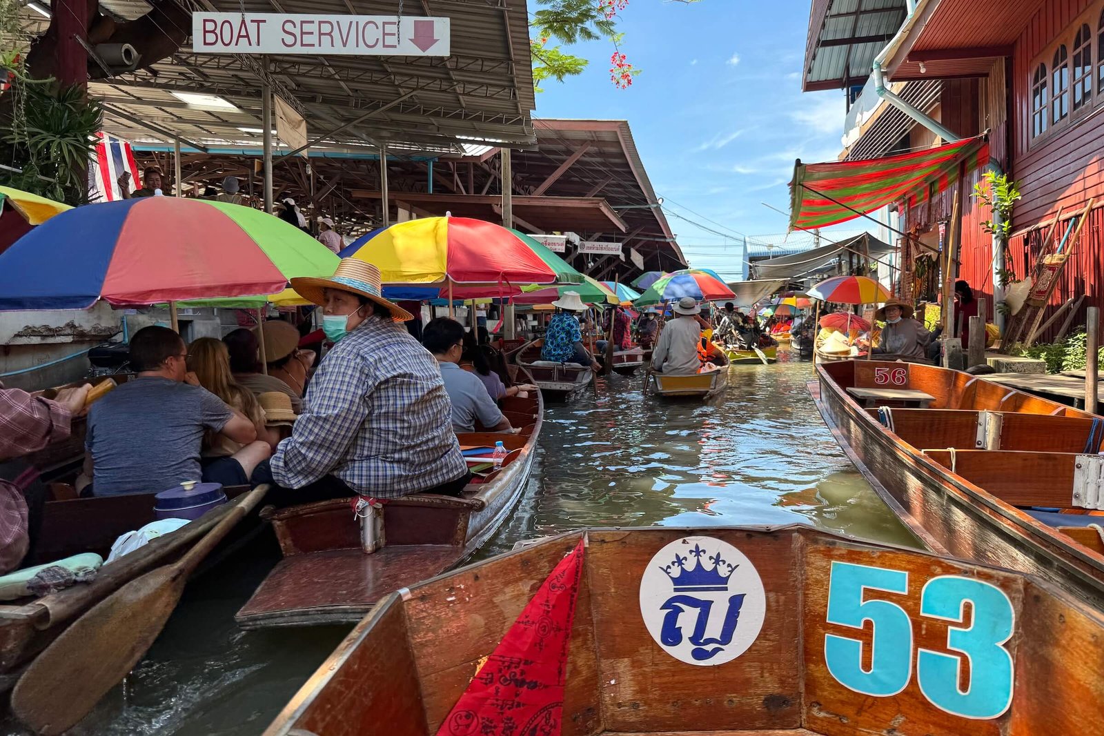 Boat service and passenger boats at Damnoen Saduak.
