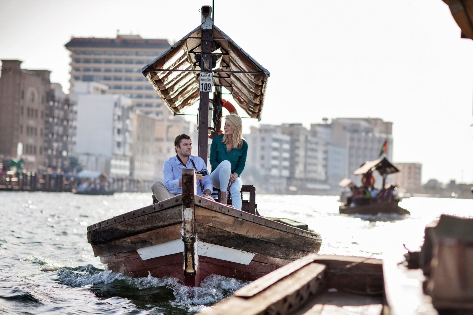 Passengers aboard a traditional abra on Dubai Creek